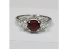 Elegant Round Ruby Prong-Set Ring Surrounded by Diamonds